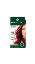 Herbatint hair color gel packaging with a person with red hair.