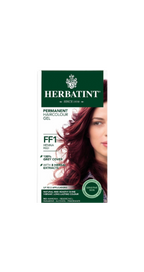 Herbatint hair color gel packaging with a model featuring Henna Red hair color.