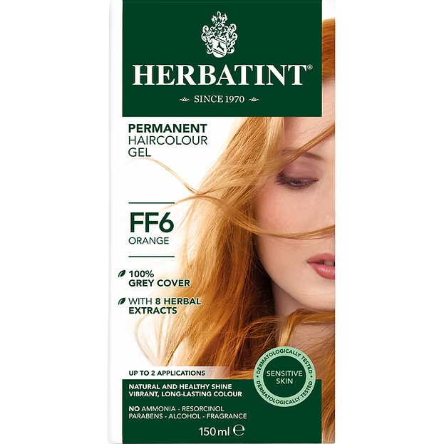 Herbatint hair color gel packaging with a model featuring orange hair.